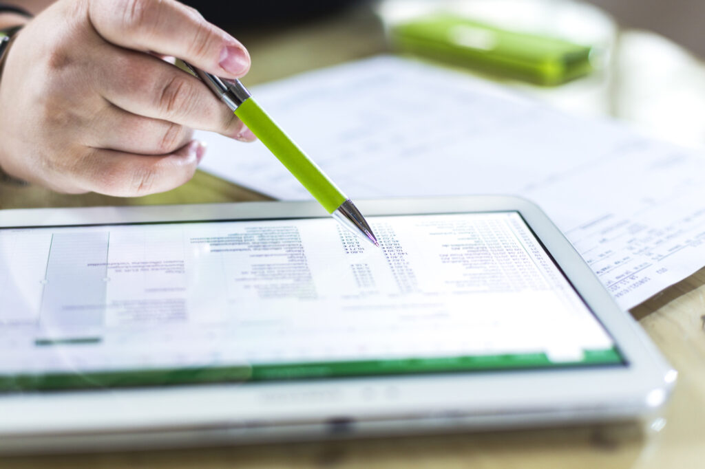 A Person Using Tablet